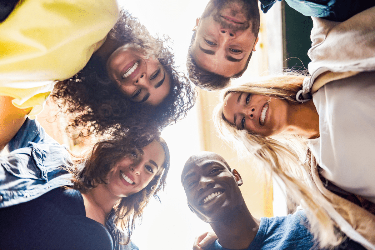 People in a circle gathering together