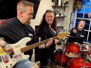 Man and woman playing guitar