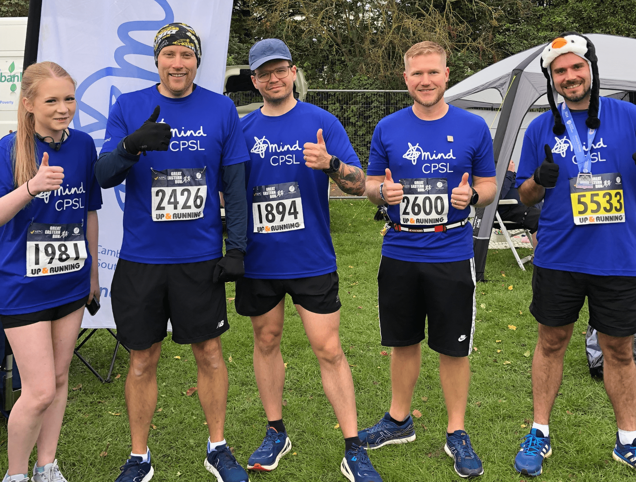 Group of runners wearing CPSL Mind t-shirts